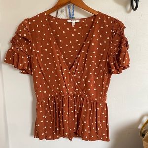 Polka dot peplum top